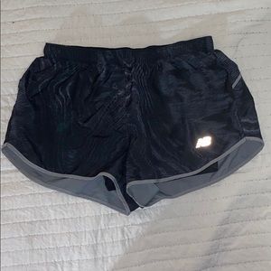 Black new balance shorts with silver detailing